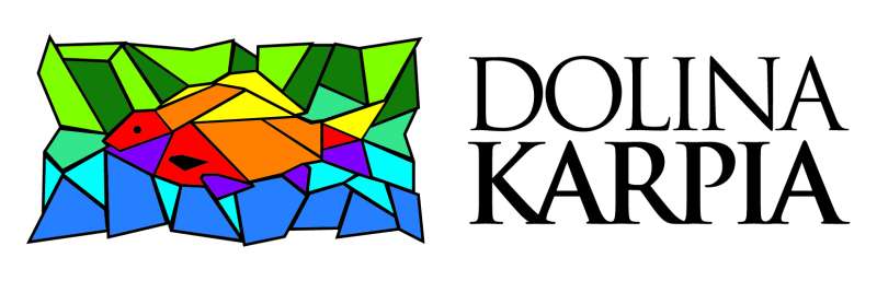 Logo LGD Dolina Karpia Witraż w kształcie ryby i napis Dolina Karpia